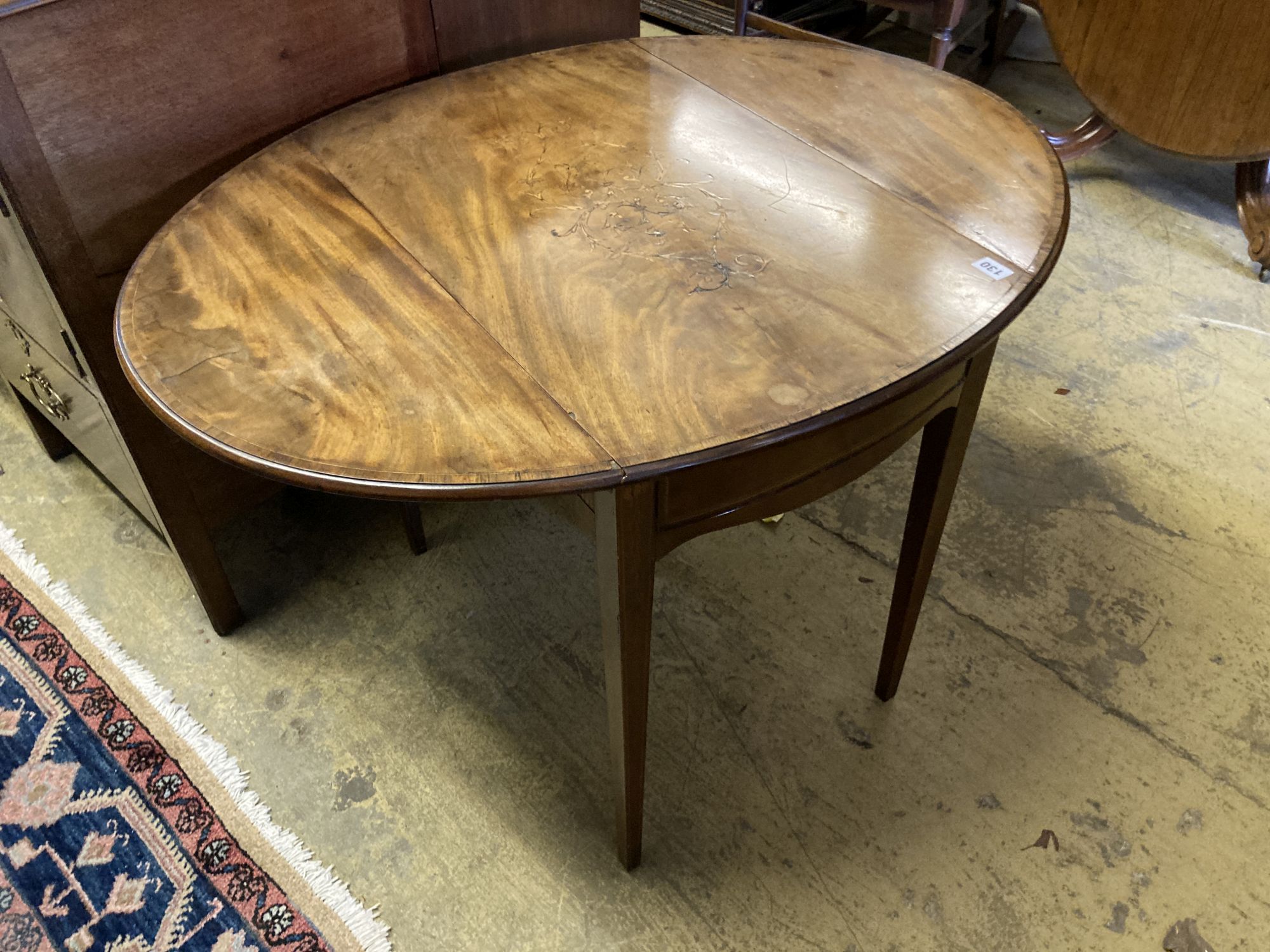 A George III marquetry inlaid oval mahogany Pembroke table, width 74cm, depth 46cm, height 66cm